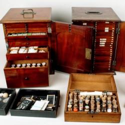 Elcock's archive of microscope slides and preparatory materials, displayed in portable wooden cases